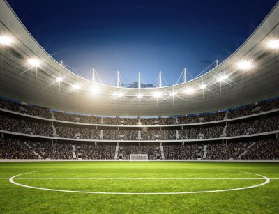 Papier peint  Un stade de football moderne la nuit vu depuis le terrain