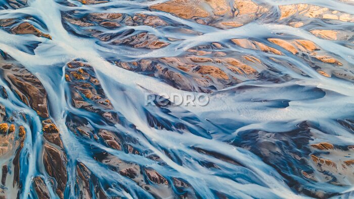 Papier peint  Une rivière s'écoulant des glaciers islandais