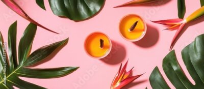 Papier peint  Vibrant summer flat lay with strelitzia flowers, tropical leaves, and bright candles on a pink background for seasonal decor inspiration.