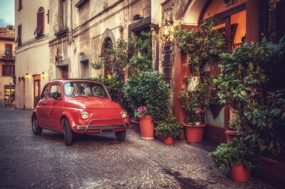 Papier peint  Voiture rétro rouge dans un paysage italien