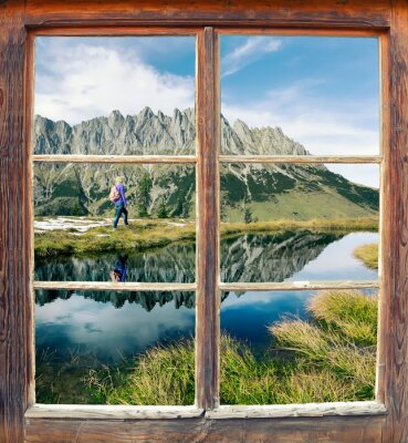 Papier peint  Vue d'une femme à la montagne depuis une fenêtre