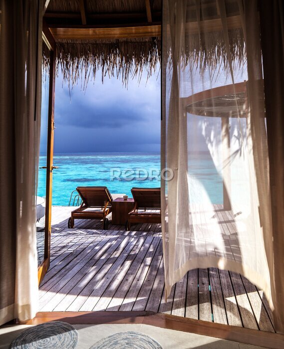 Papier peint  Vue depuis une fenêtre de terrasse sur un océan bleu