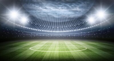 Papier peint  Vue du terrain et du stade illuminés par les projecteurs