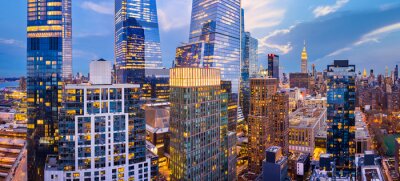 Papier peint  Aerial panorama of New York City skyscrapers at dusk as seen from above the 29th street, close to Hudson Yards and Chelsea neighborhood