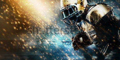 Poster  American football sportsman player on stadium running in action. Sport wallpaper with copyspace.