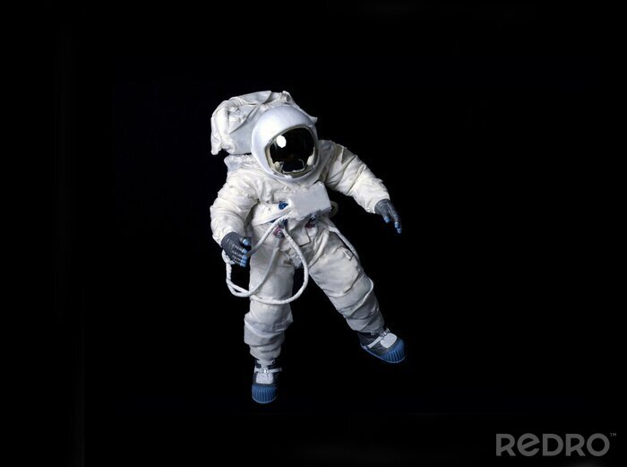 Poster  Astronaute flottant sur un fond noir.