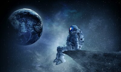 Astronaute sur un rocher