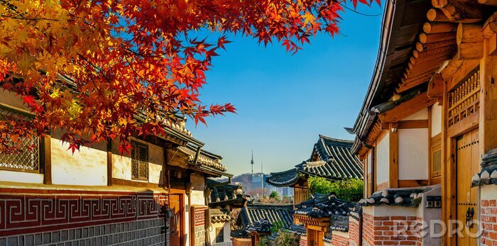 Poster  Autumn seasons at Bukchon Hanok Village. Traditional Korean style architecture in Seoul,Korea.