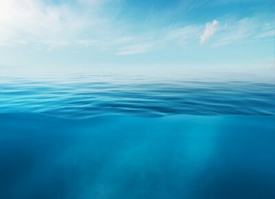 Poster  Blue sea or ocean water surface and underwater with sunny and cloudy sky
