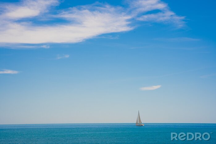 Poster  Blue sky seascape with copy space. Calm sea with sailboat on the horizon.