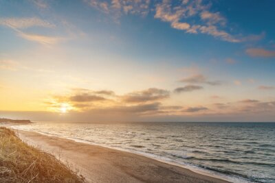 Poster  Charmant coucher de soleil sur la plage