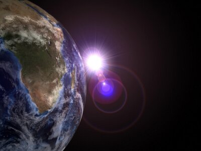 Cosmos sombre et la Terre illuminée par le soleil