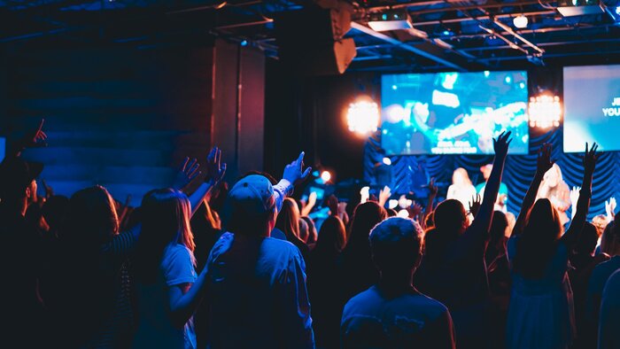 Poster  crowd of people at worship concert