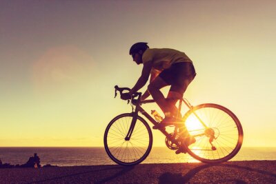 Poster  Cycliste et coucher de soleil