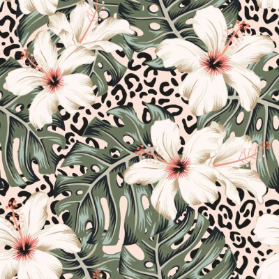Feuilles de jungle et fleurs d'hibiscus tropicales