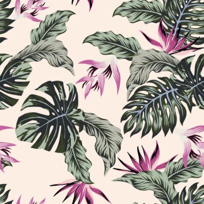 Feuilles exotiques avec des fleurs roses