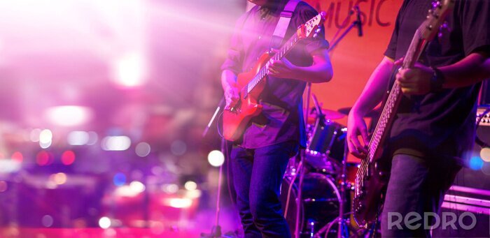 Poster  Guitariste rock avec une guitare rouge