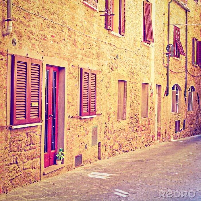 Poster  Maisons en pierre accents rouges