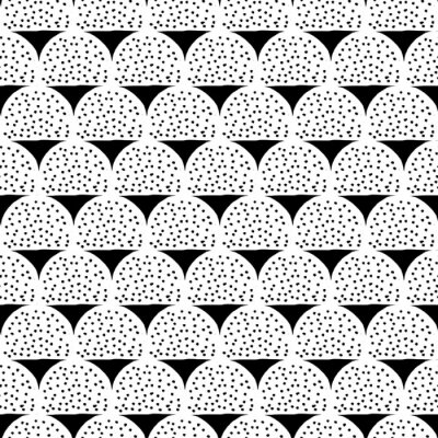 Motif noir et blanc avec des points et des triangles