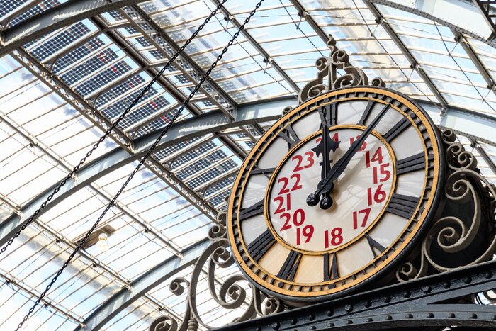 Poster  Old-fashioned style clock at Kings Cross train station in London