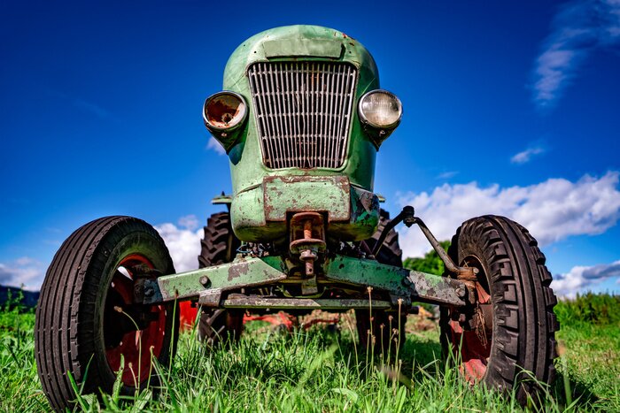 Poster  Old tractor in the Alpine meadows