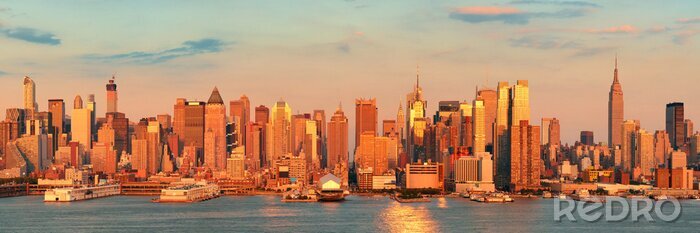 Poster  Panorama de ville au coucher de soleil