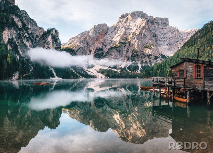 Poster  Panoramic view of Braies Lake with the hut and boats in Dolomites mountains and Seekofel in the morning, Pragser Wildsee, South Tirol, Italy