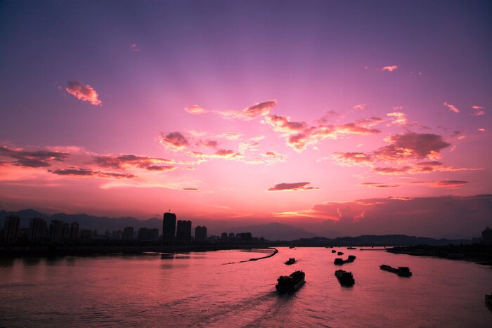 Poster  Paysage urbain au coucher du soleil