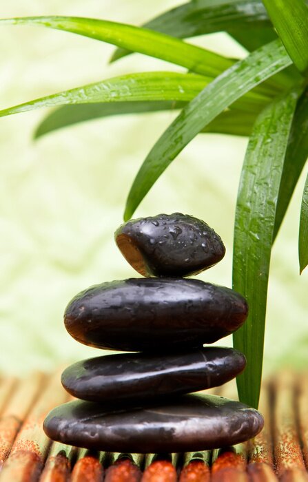 Poster  Pierres zen sur une natte de bambou