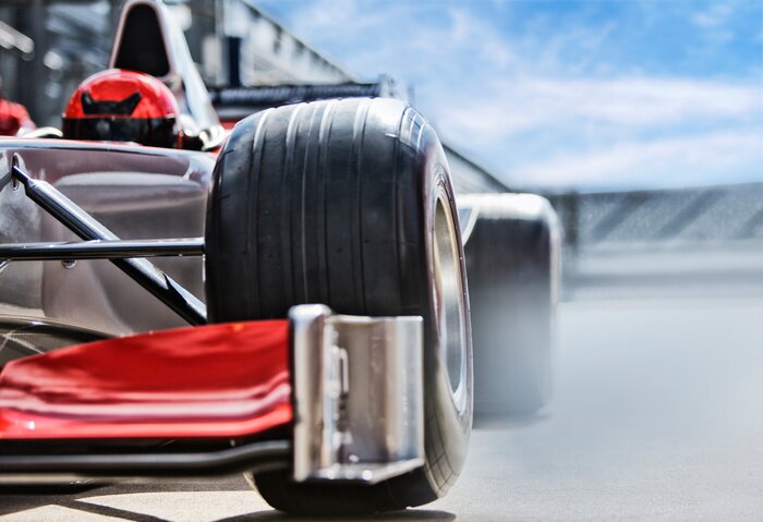 Poster  Race car sitting on track