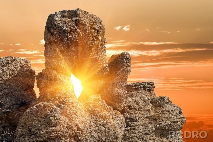 Poster  Soleil entre les rochers