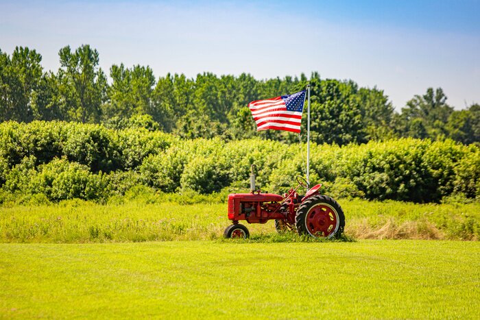 Poster  Symbols of American farming: tractor and flag