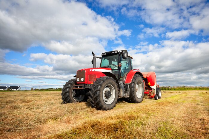 Poster  tracteur collecte botte de foin dans le domaine, la technique panoramique