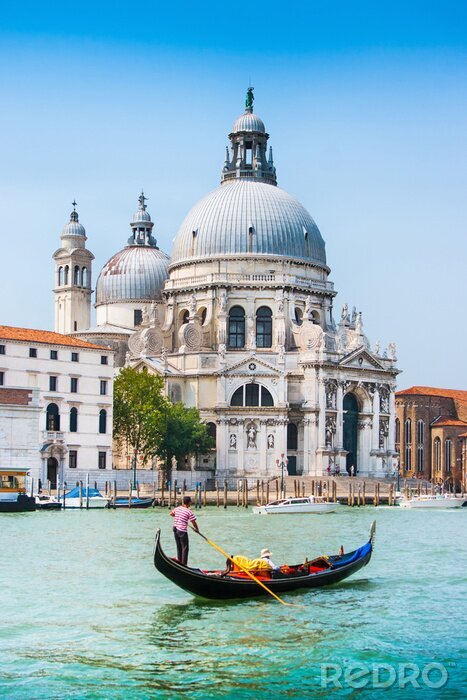 Poster  Un gondolier avec la basilique de Venise en arrière-plan