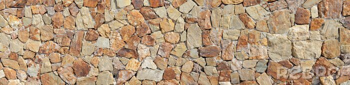 Poster  Un mur bordé de pierres