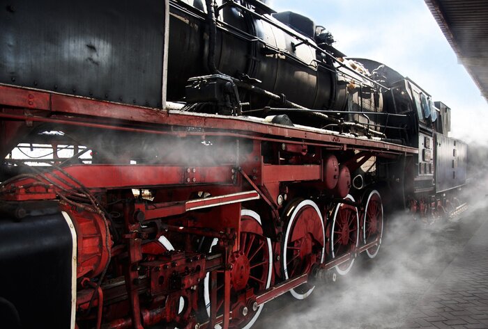 Poster  Une vieille locomotive dans des nuages de vapeur