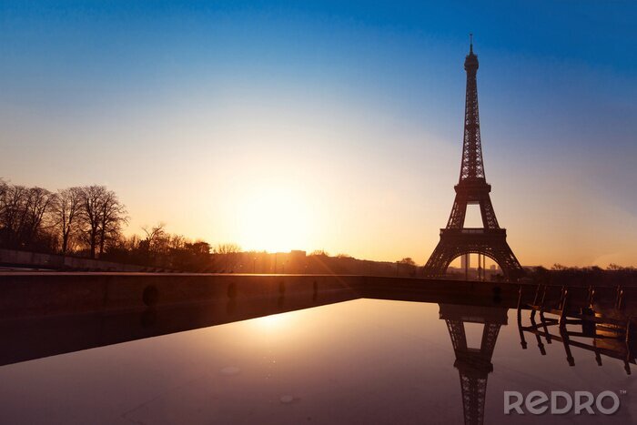 Poster  Vue de Paris avec coucher de soleil