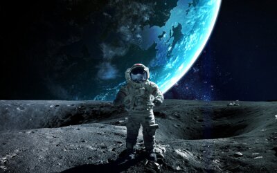 Astronaute debout devant la Terre