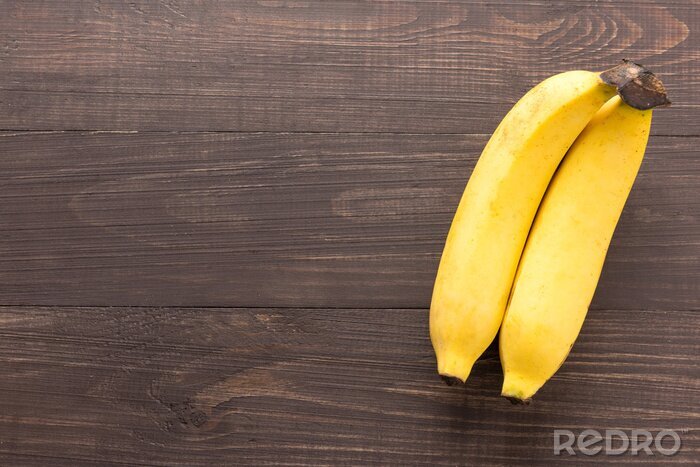 Sticker  Deux bananes sur des planches en bois