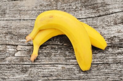 Sticker  Deux bananes sur des planches grises