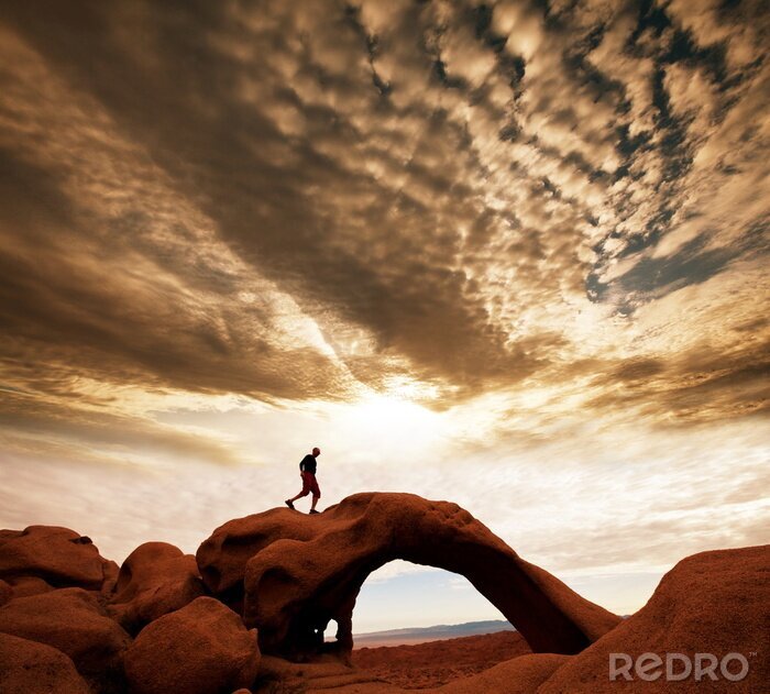 Sticker  Escalade sportive sur une arche rocheuse