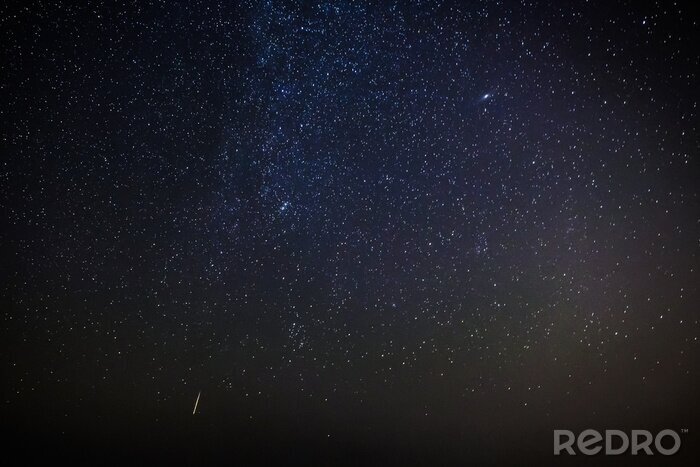 Sticker  Étoile filante sur le fond du cosmos