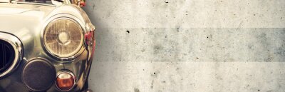 Sticker  Fragment d'une vieille voiture sur le fond du mur
