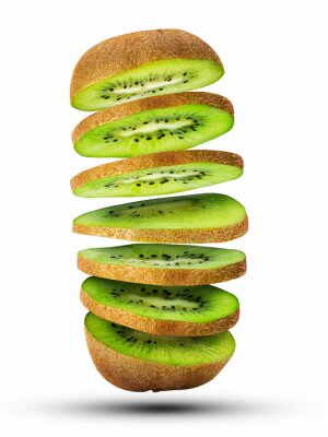 Sticker  Fresh sliced kiwi fruit flying in the air isolated on white.