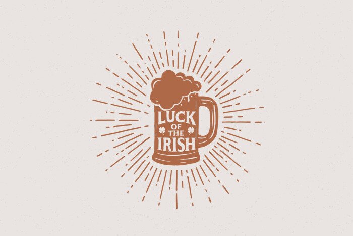 Sticker  Hands drawn beer mug with the inscription Irish luck in the rays of light. Vintage illustration on the theme of St. Patrick's Day. Monochrome engraving style.