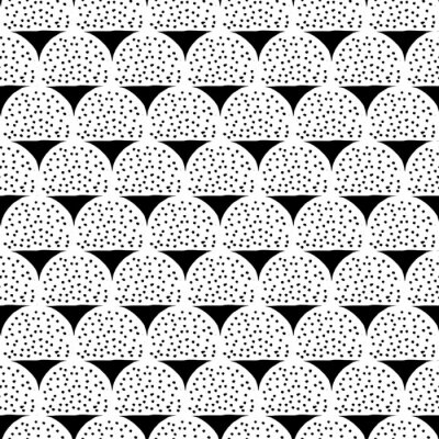 Motif noir et blanc avec des points et des triangles