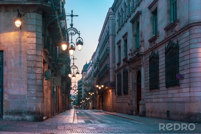 Sticker  Narrow cobbled medieval empty street with beautiful street lights in Barri Gothic Quarter in the morning, Barcelona, Catalonia, Spain