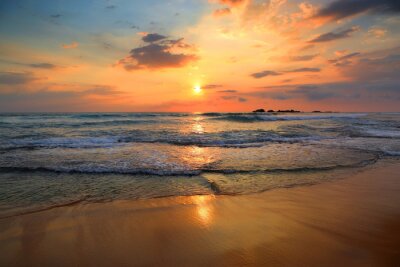 Paysage au coucher du soleil sur la plage