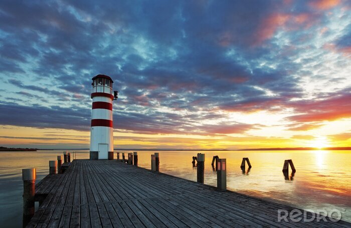 Sticker  Phare au lac de Neusiedl au coucher du soleil