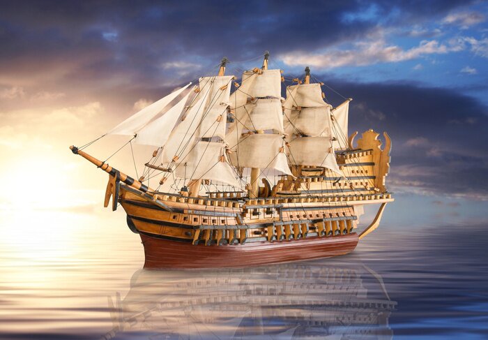 Sticker  Un voilier se détachant sur un coucher de soleil doré